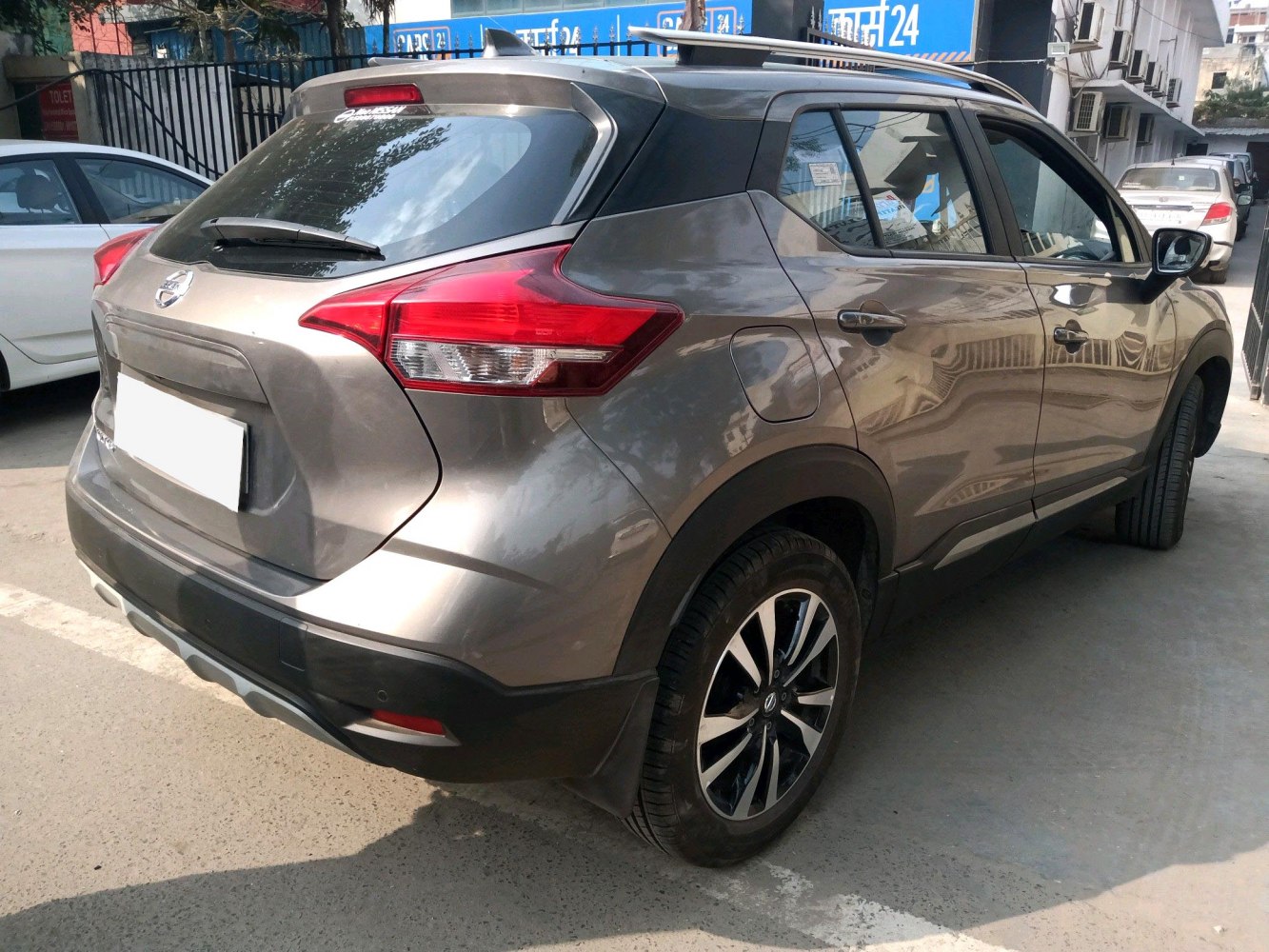 Rear and side view showing taillights and alloy wheels