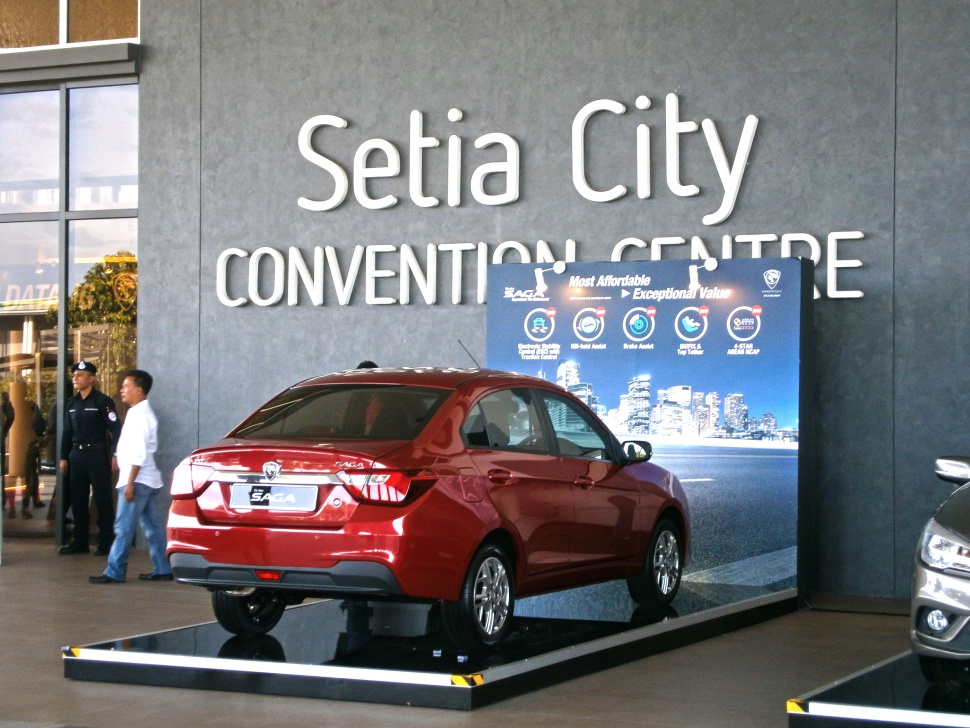Red sedan rear view on platform with detailed lighting