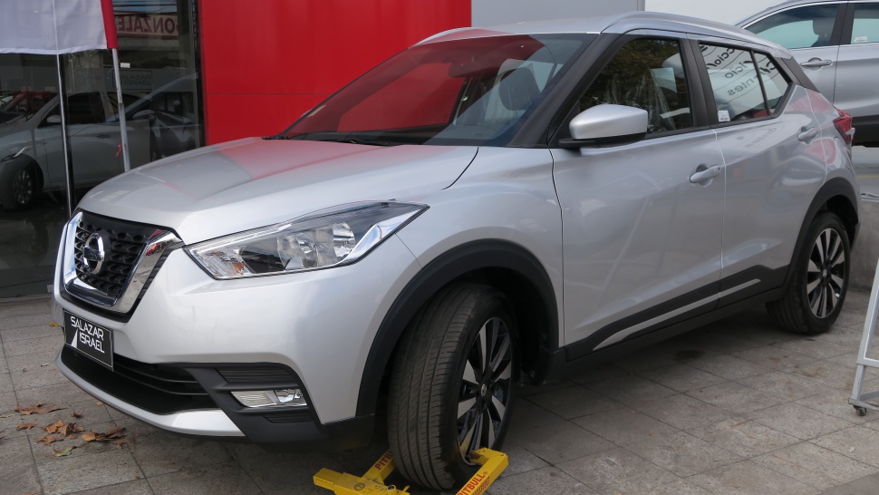 Front and side view of silver compact SUV with alloy wheels and sharp headlights