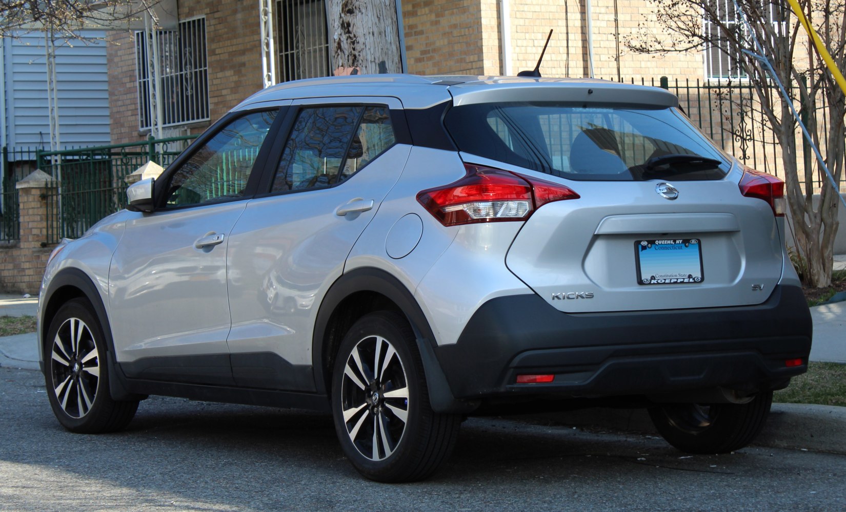 Rear and side profile of compact SUV with modern taillights and alloy wheels