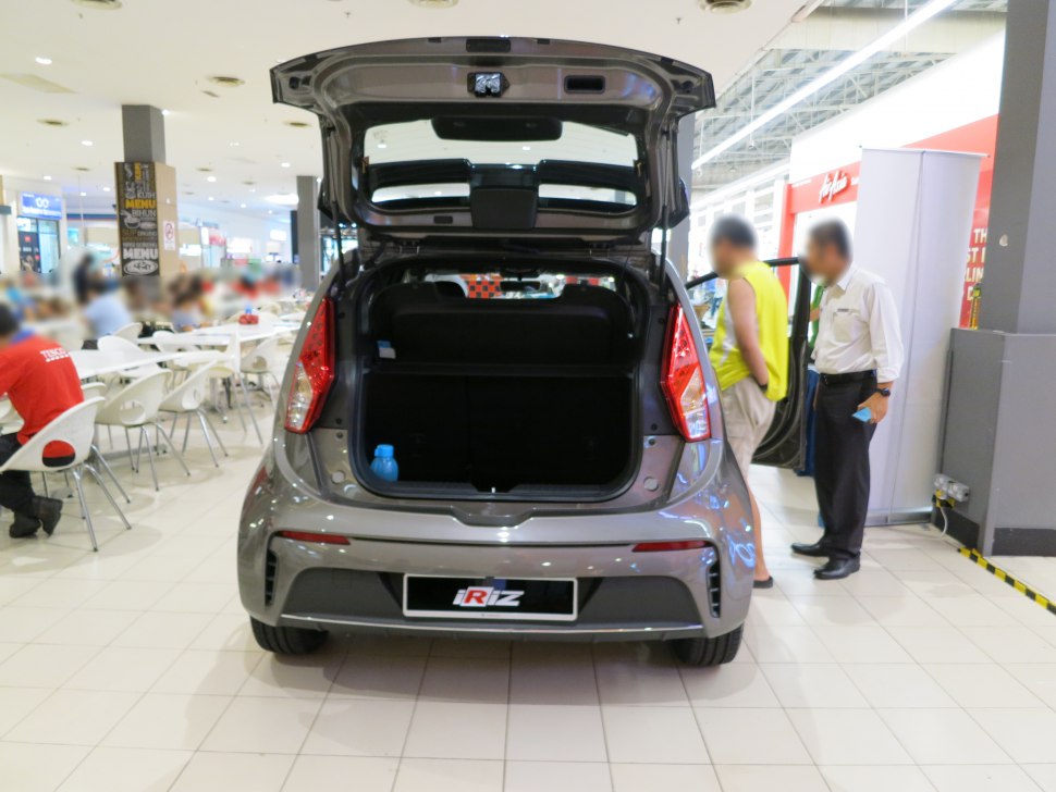 Rear open tailgate with trunk space of a compact hatchback.