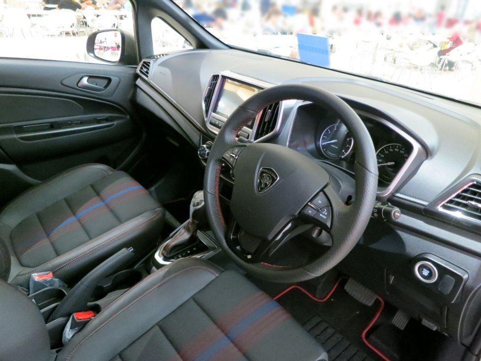 Modern dashboard and multi-function steering wheel with cloth seats