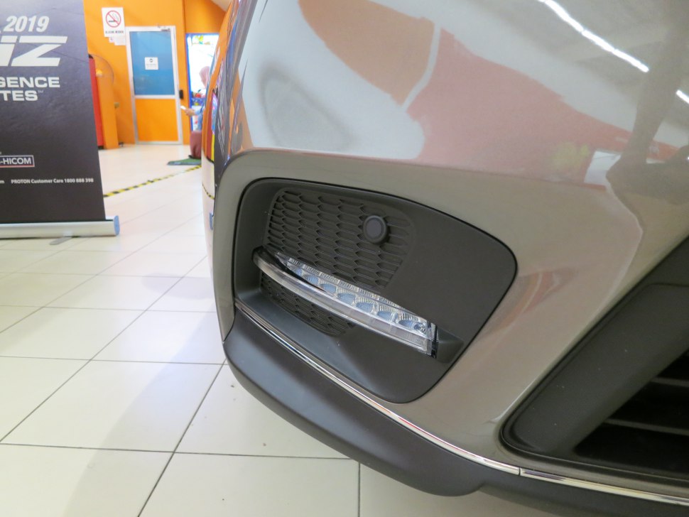 Front bumper fog light and sensor close-up