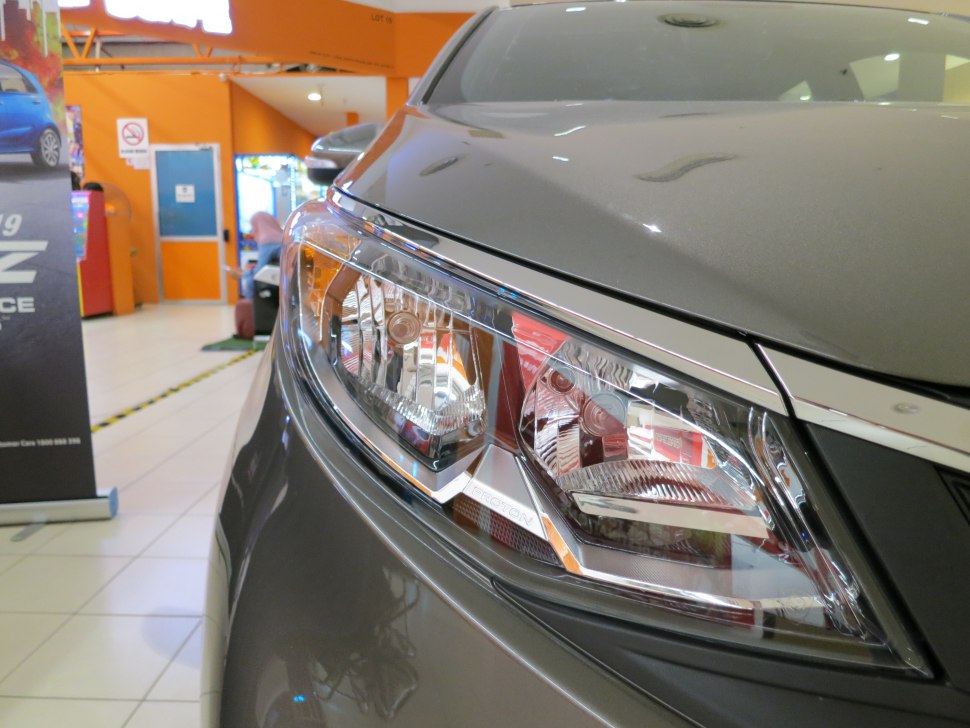 Close-up of modern headlight with intricate detailing
