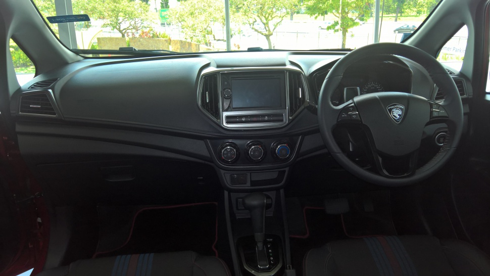 Dashboard, steering wheel, touchscreen, climate controls, automatic gear shift