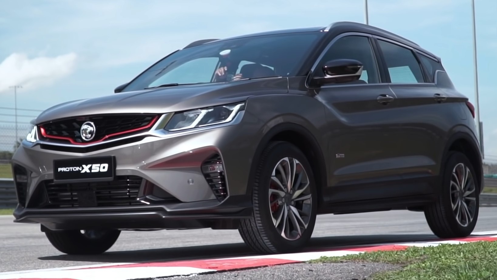 Front view of modern SUV with LED headlights and alloy wheels