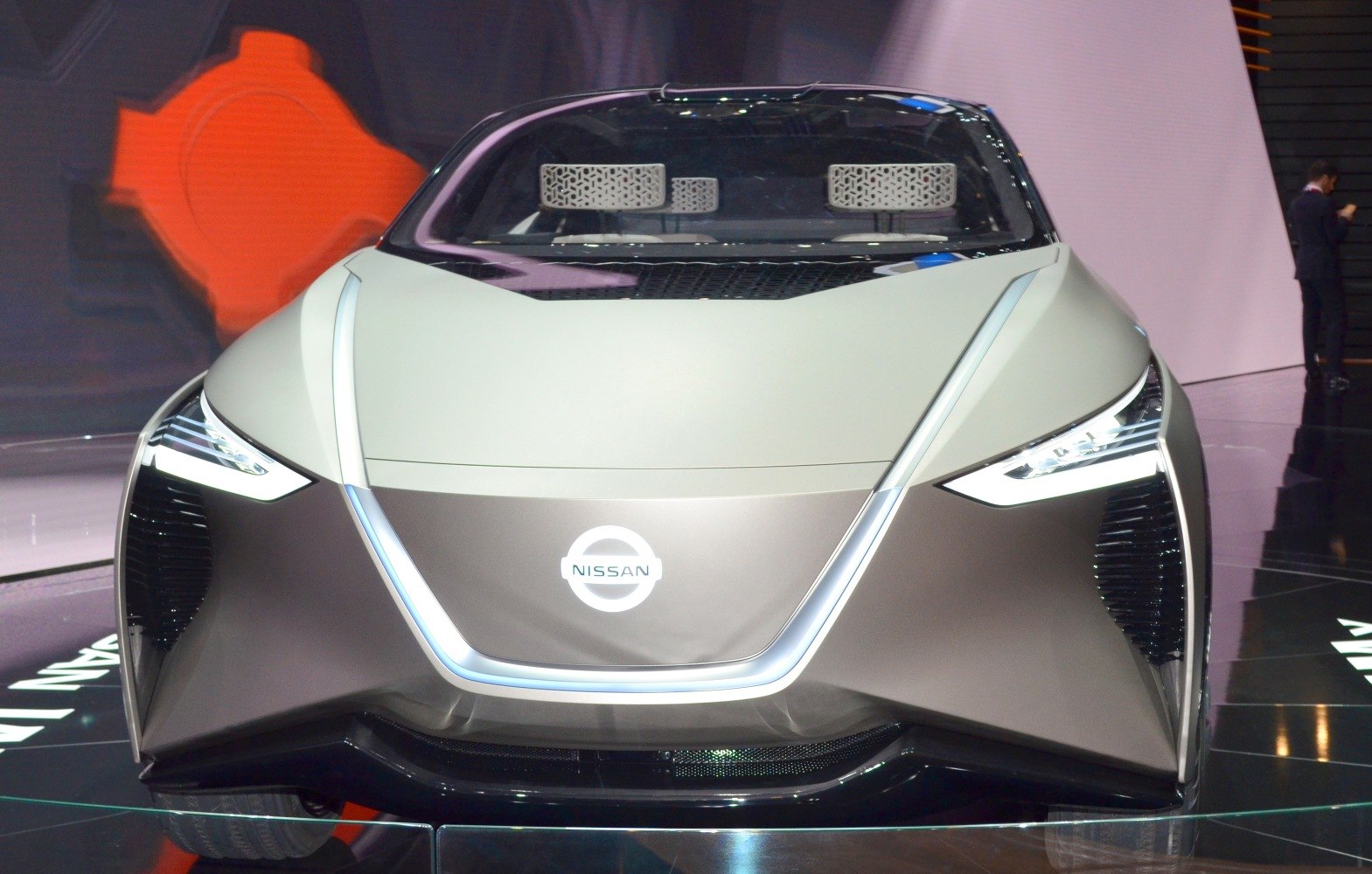 Futuristic LED headlights and aerodynamic front fascia of a concept SUV.
