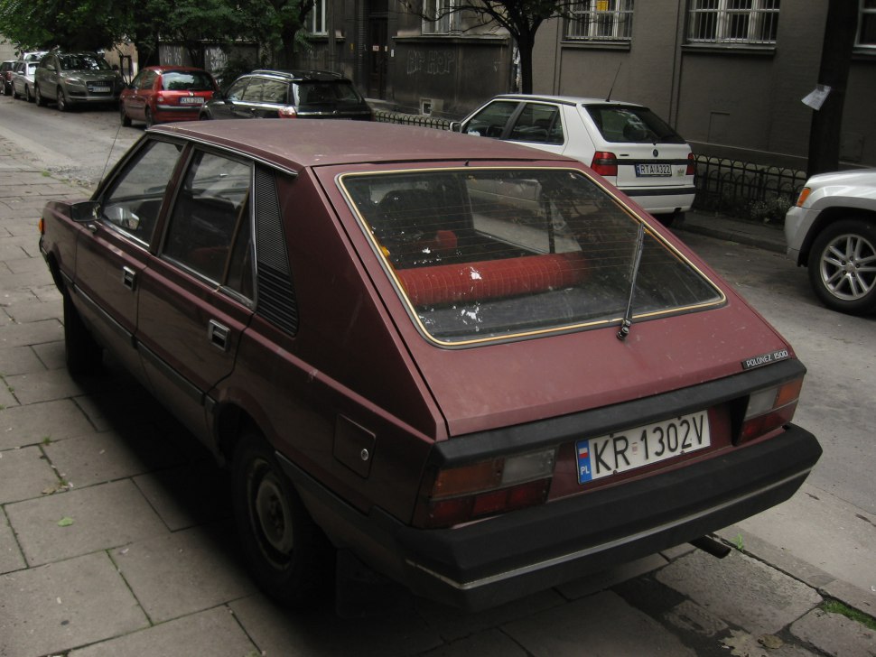 Hatchback with distinctive slanted rear window and angular shape