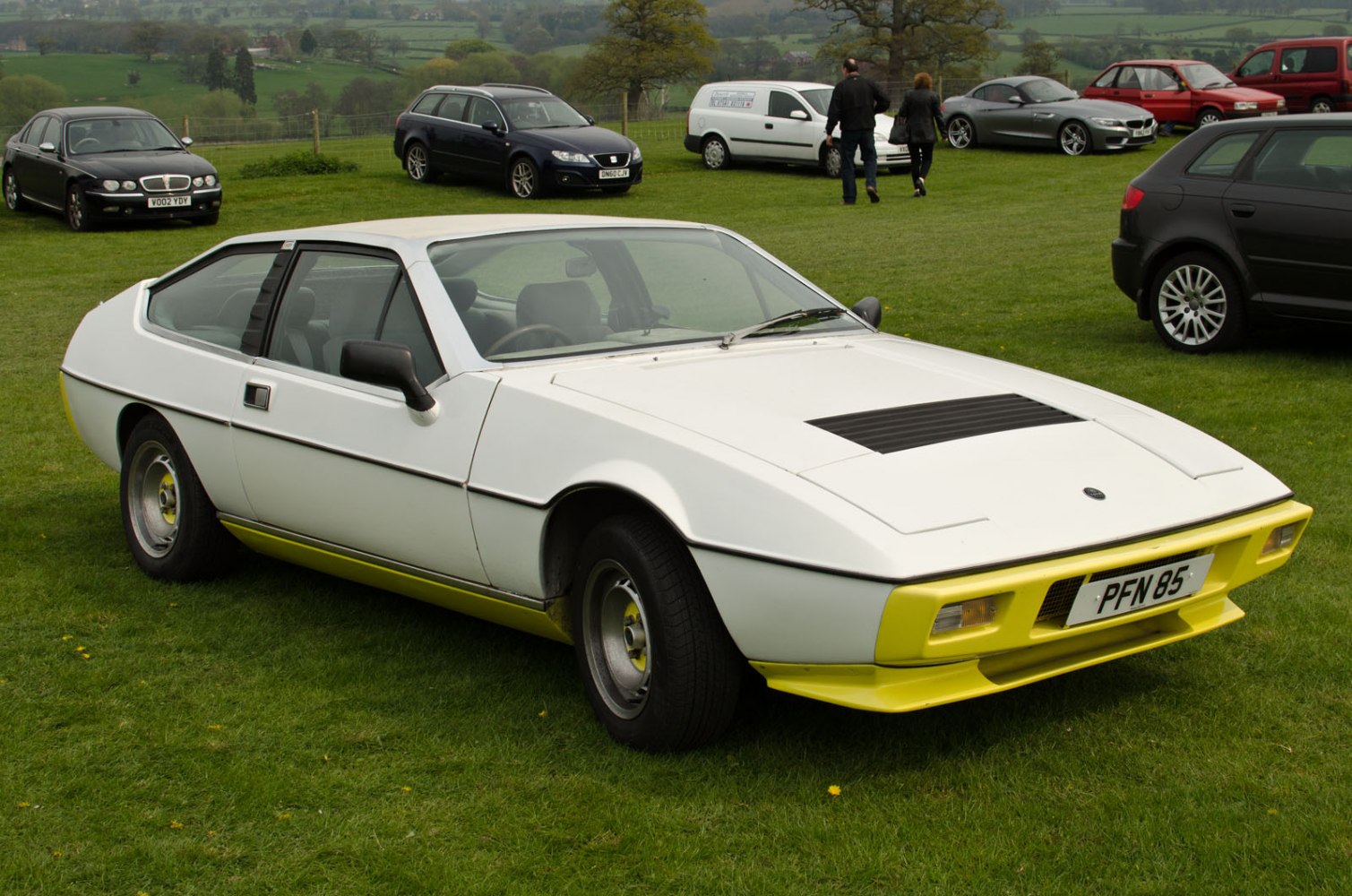 Wedge-shaped sports coupe with pop-up headlights and angular aerodynamic design