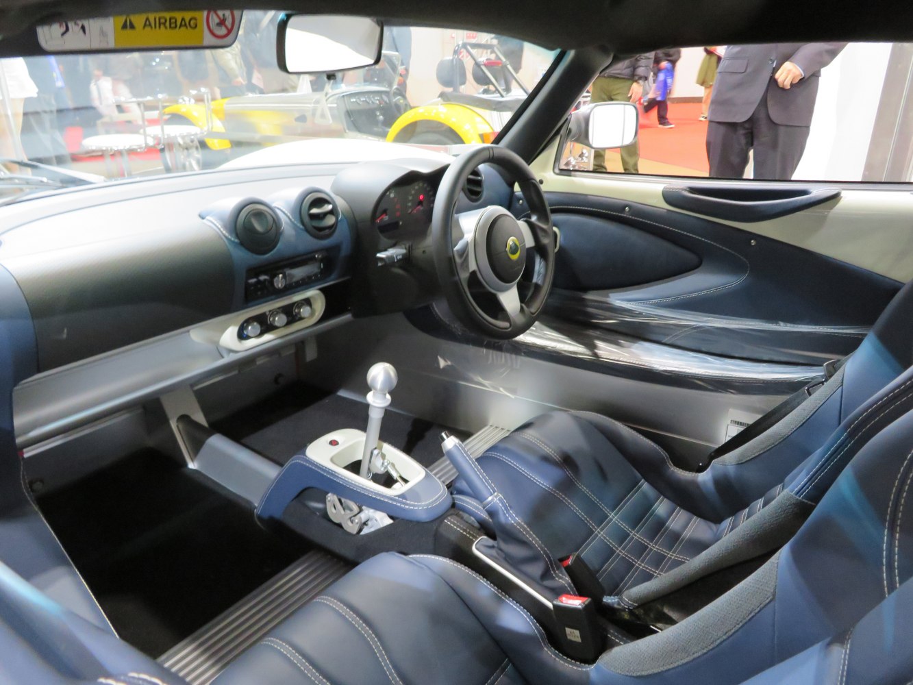 Minimalist interior with sport seats and manual gearstick