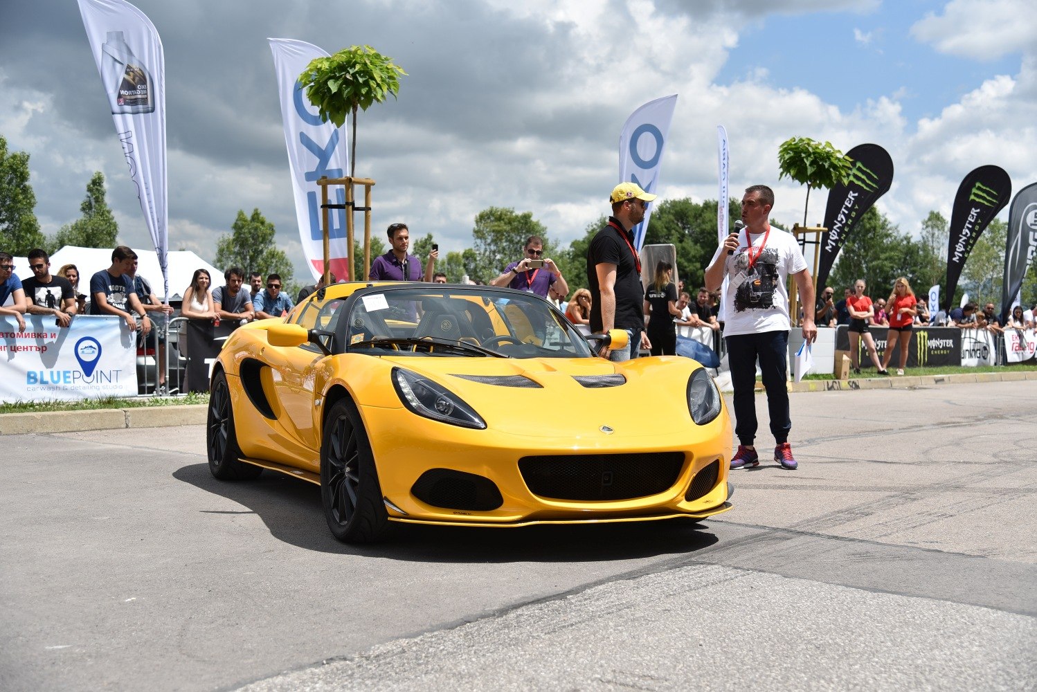 Yellow sports car front side view with aerodynamic design