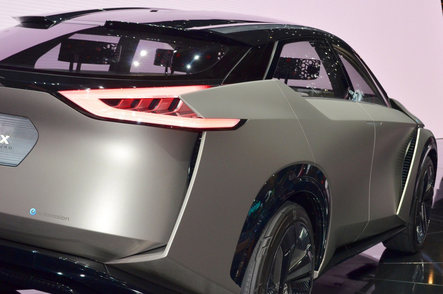 Futuristic rear design with distinctive LED tail lights and aerodynamic elements.