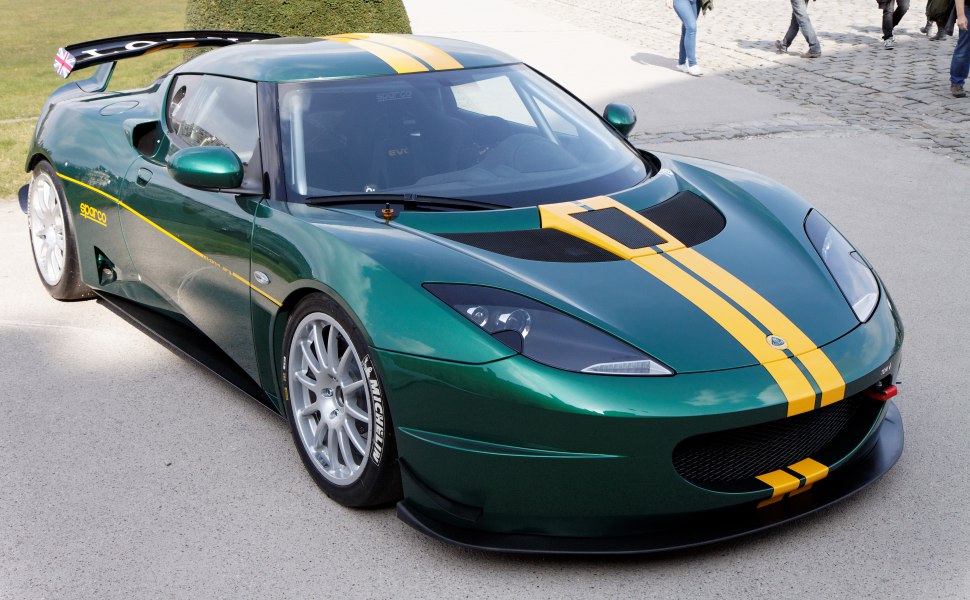 Green racing car with yellow stripes and aerodynamic design