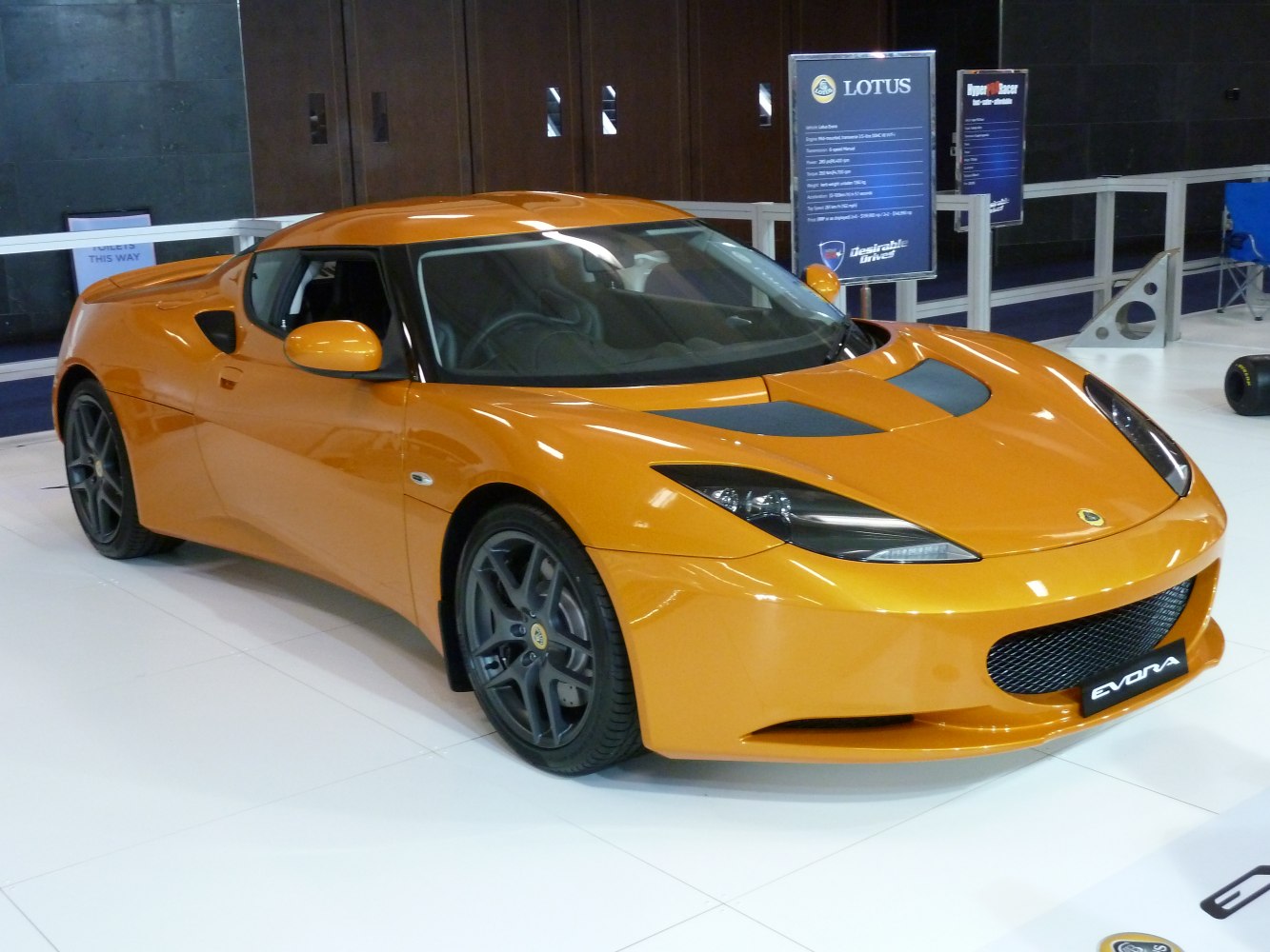 Front 3-4 view of a sleek sports coupe with aerodynamic lines and sporty details