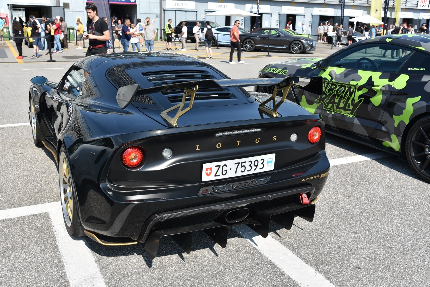Rear view with large wing spoiler and aggressive diffuser