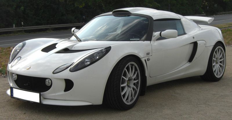 White sports coupe with aerodynamic vents and rear wing