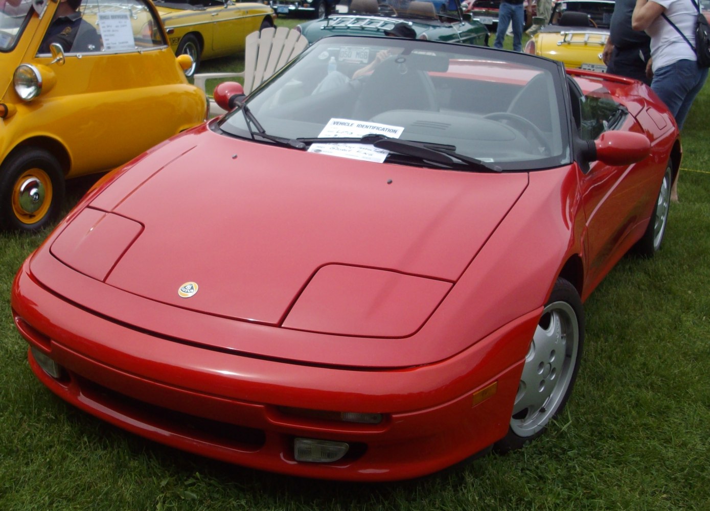 Red convertible with pop-up headlights and aerodynamic shape