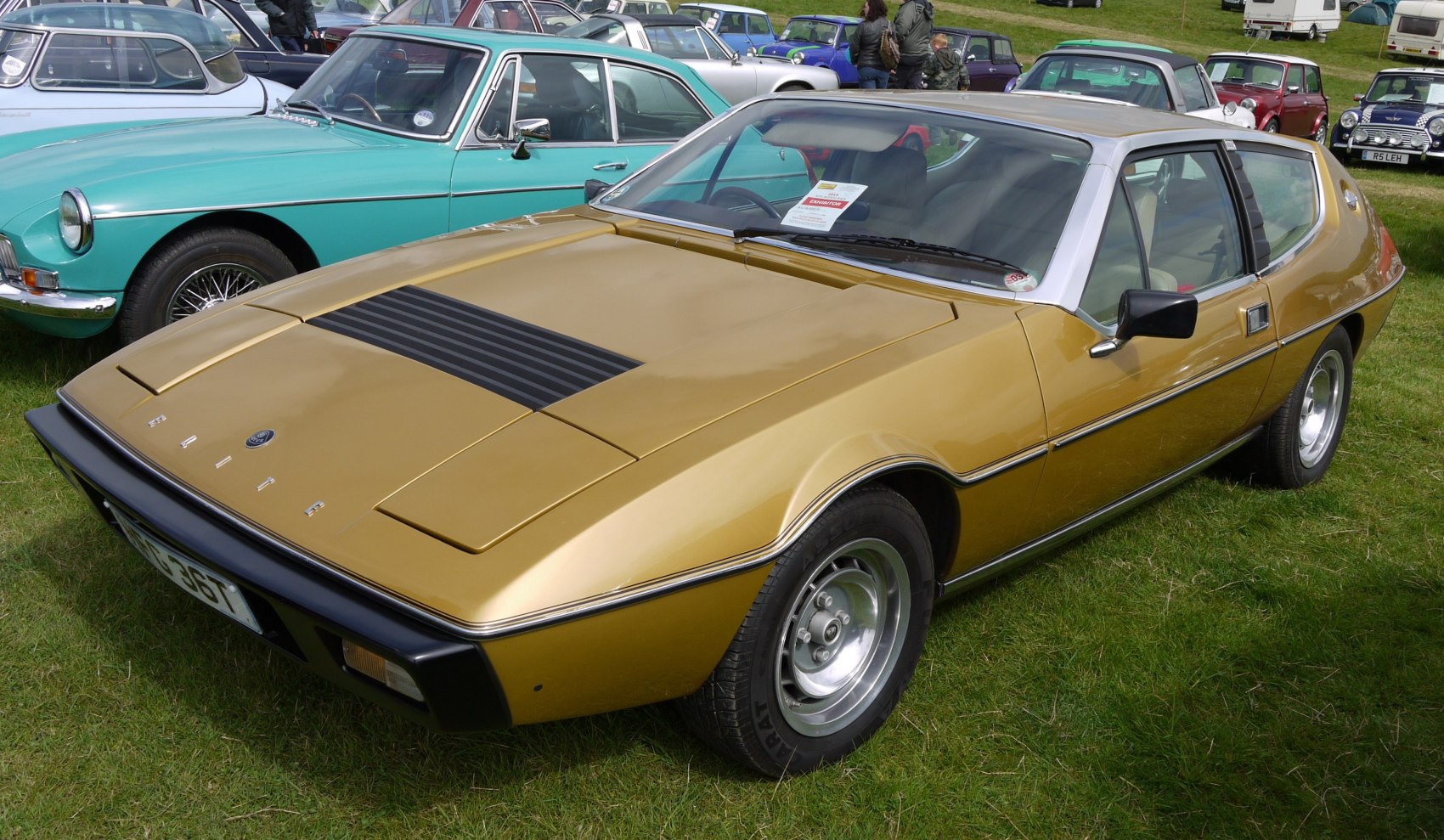 Classic wedge-shaped sports car with pop-up headlights