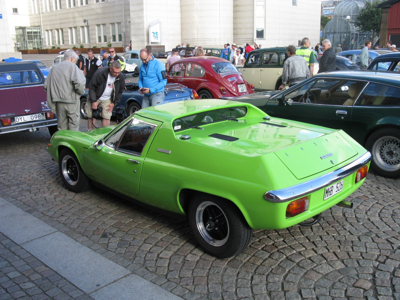 Green 1970s sports coupe with mid-engine and unique rear design