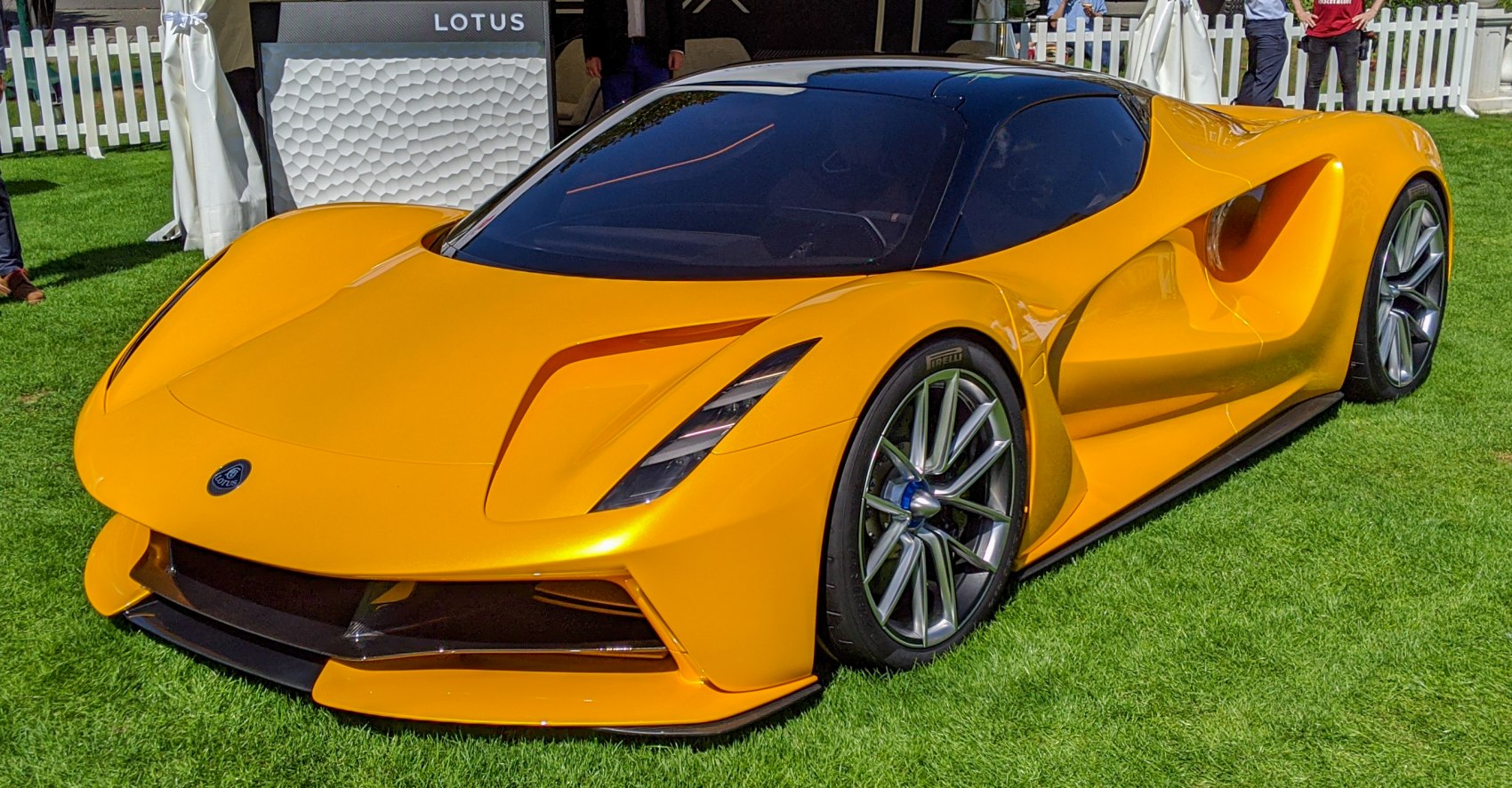 Aerodynamic electric hypercar with sharp LED headlights and sculpted air intakes