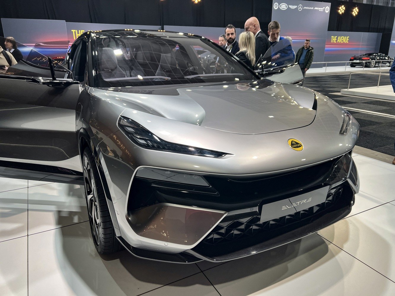 Front view of electric SUV with sleek headlights and aerodynamic design