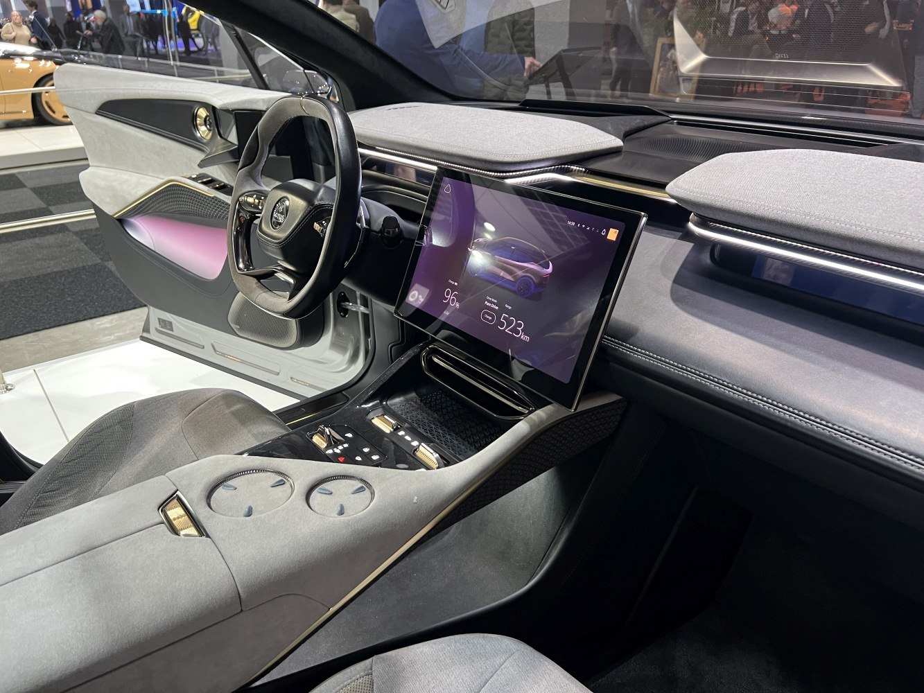 Modern interior dashboard with digital touchscreen and steering wheel