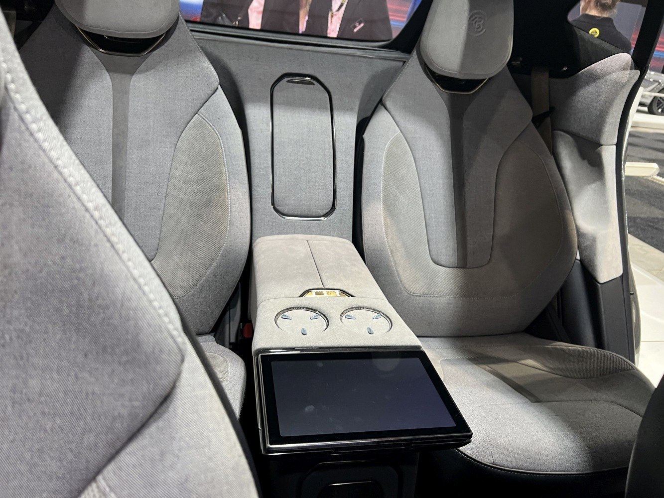 Rear seats with center console touchscreen and cup holders