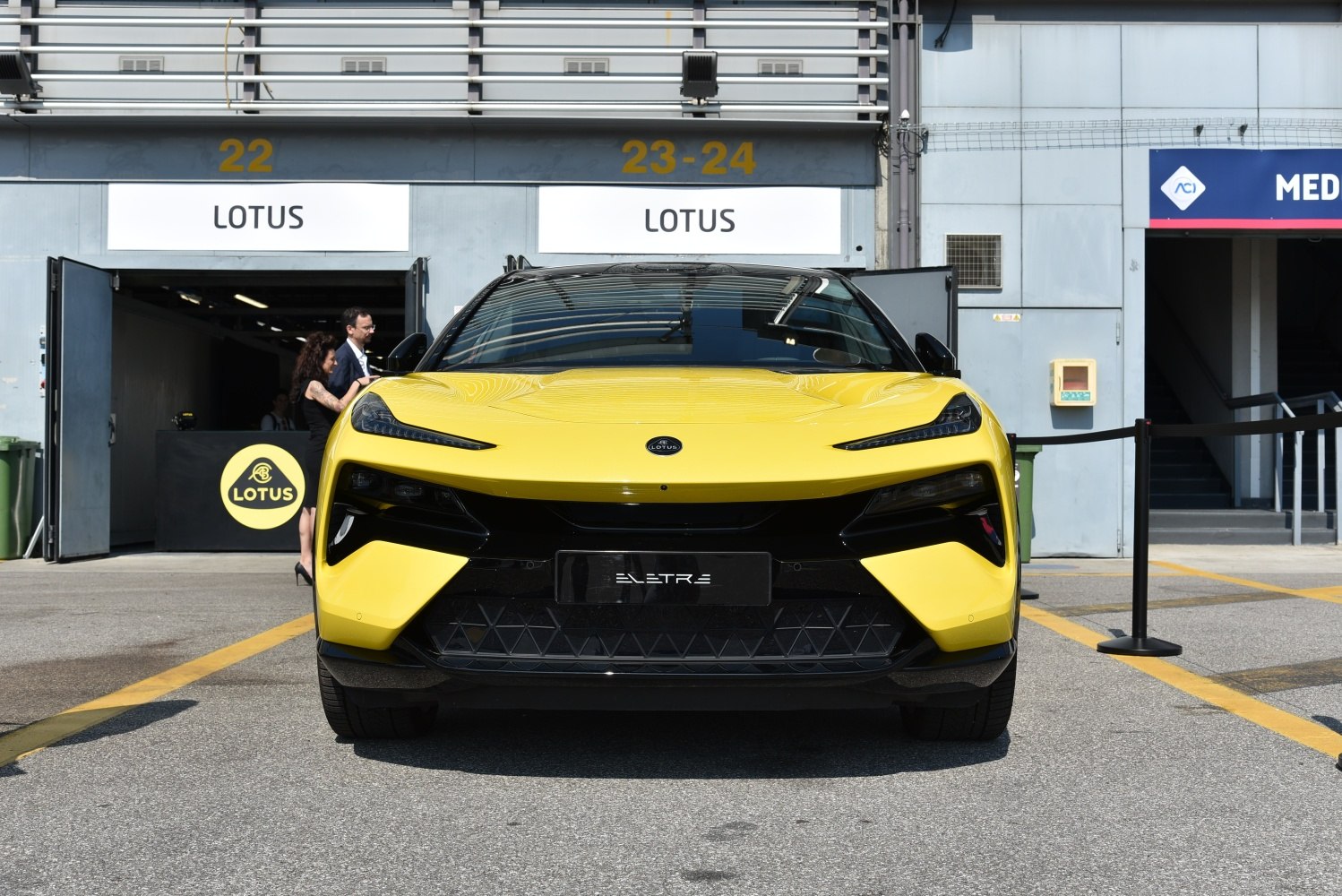 Front view with sleek headlights and aerodynamic yellow SUV design