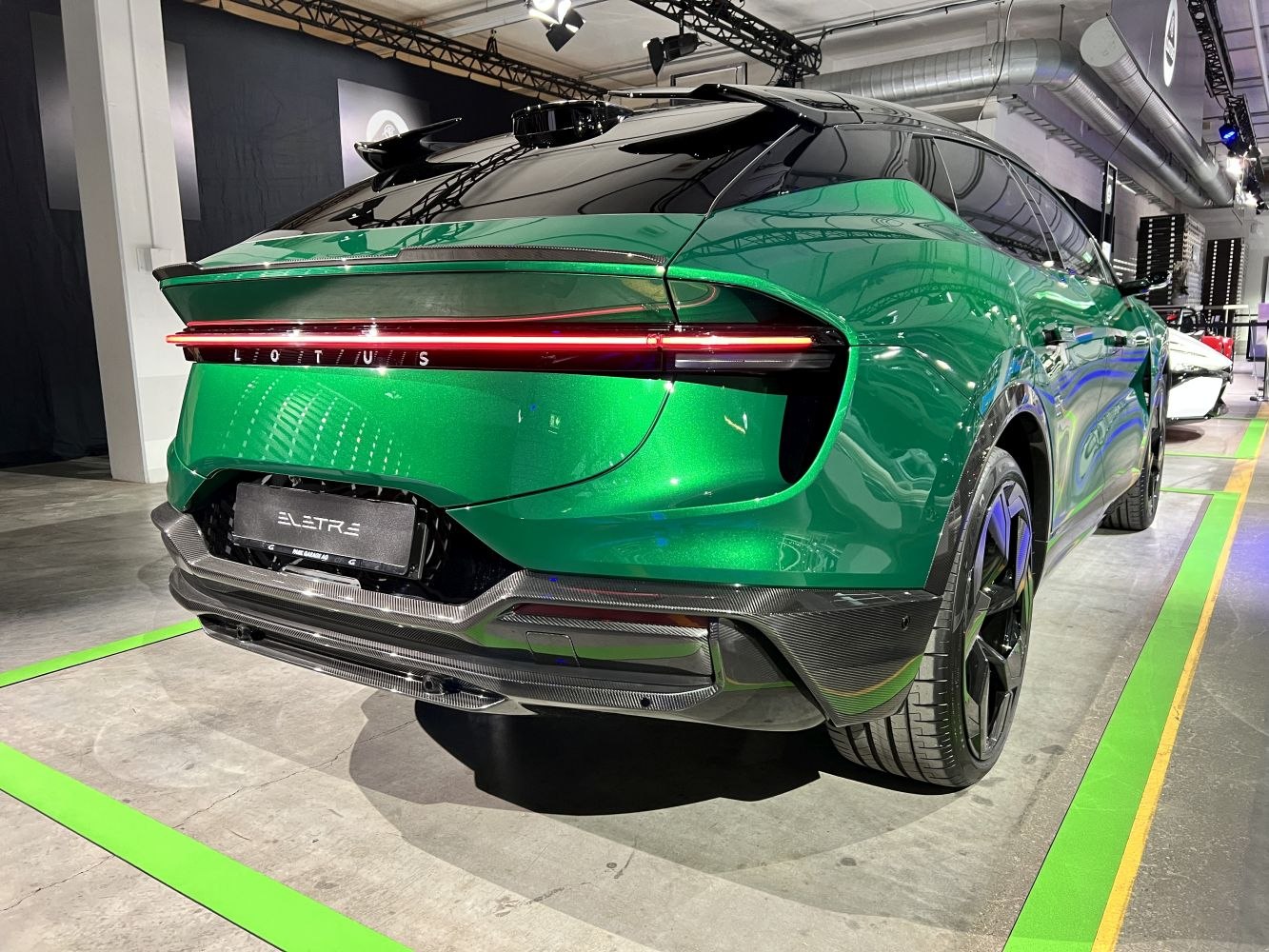 Rear view with LED tail light bar and carbon fiber diffuser