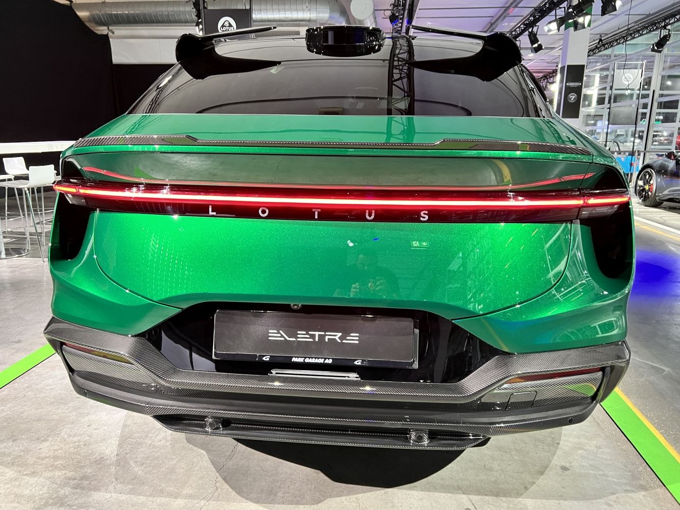 Sleek rear with continuous LED tail light bar and carbon fiber diffuser