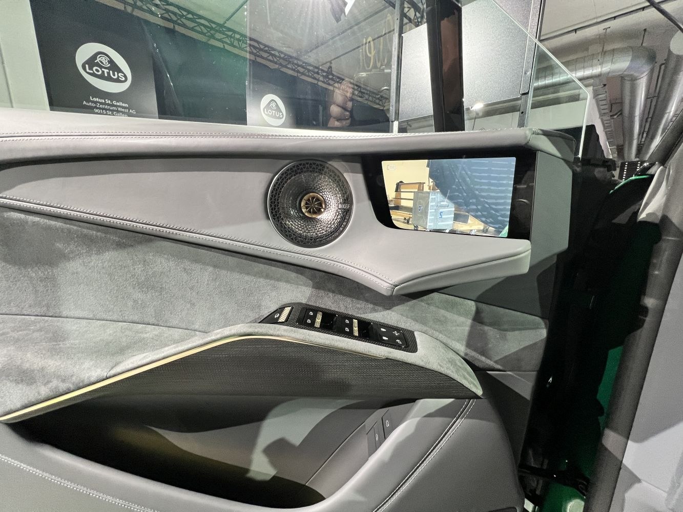 Car door interior with digital side mirror and KEF speaker