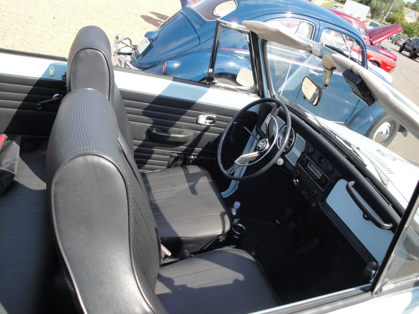 Convertible interior with classic dashboard and steering wheel