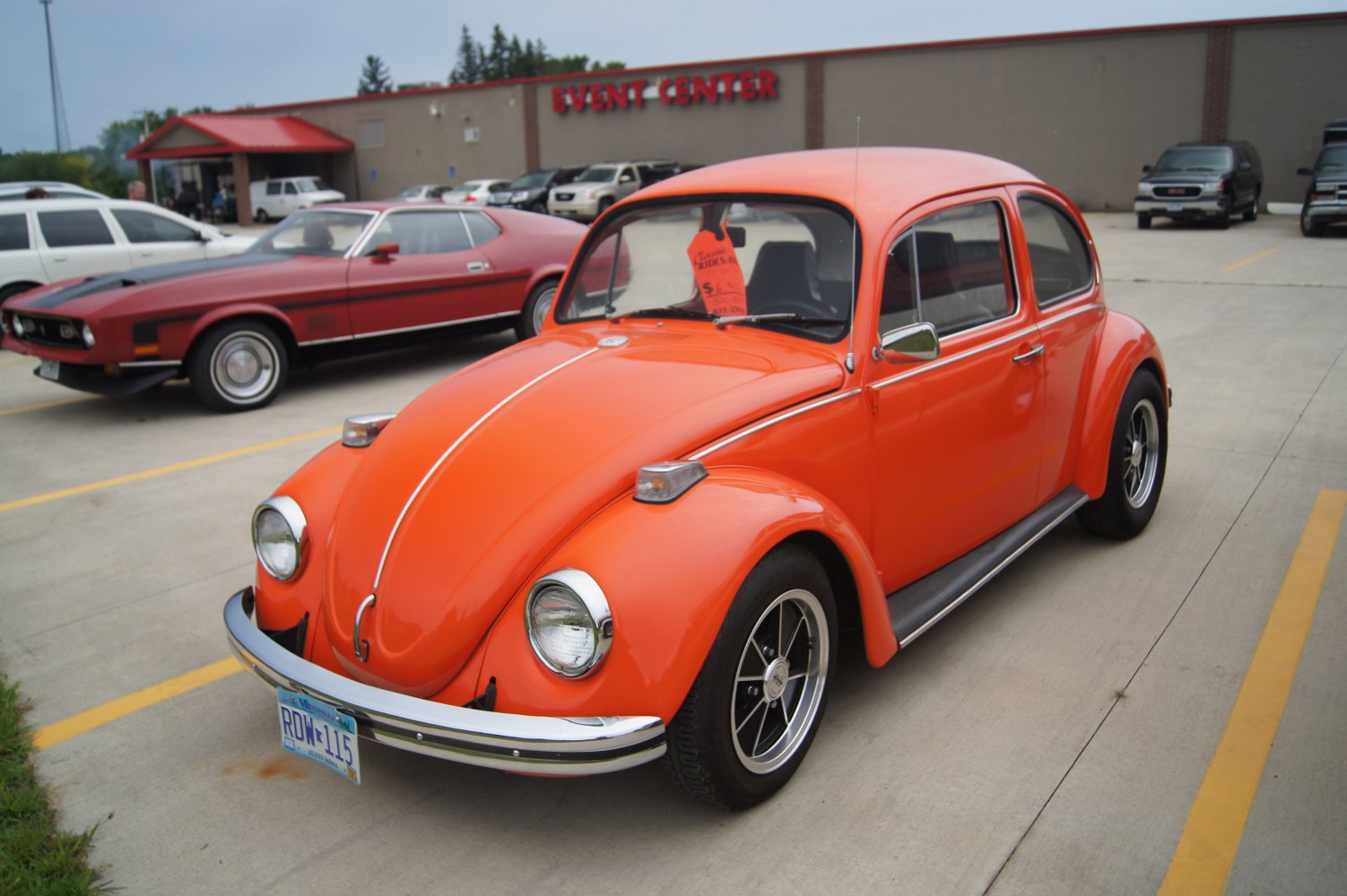 Classic vintage compact car with rounded fenders and headlights