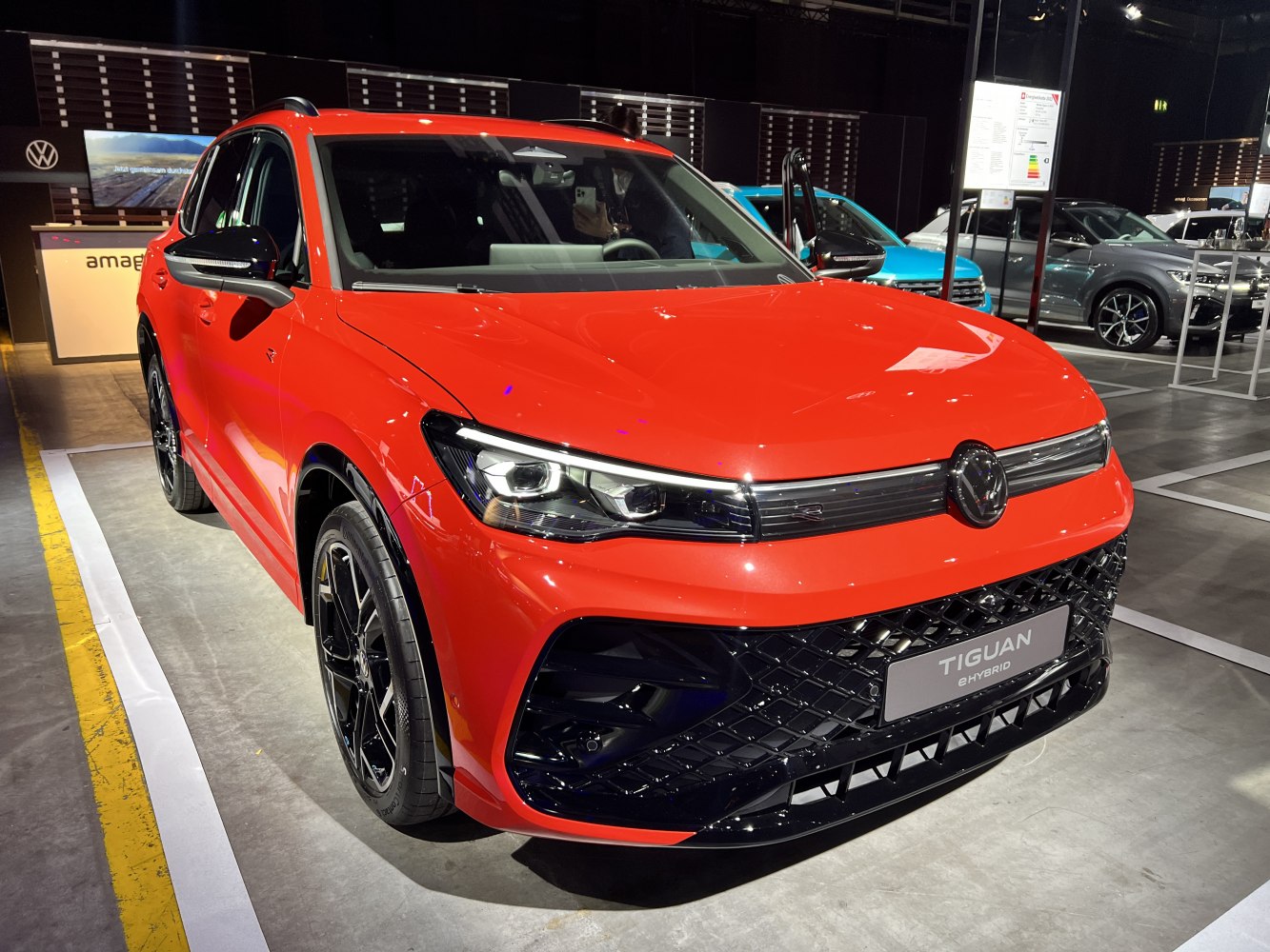 Front view with LED headlights and sporty black grille