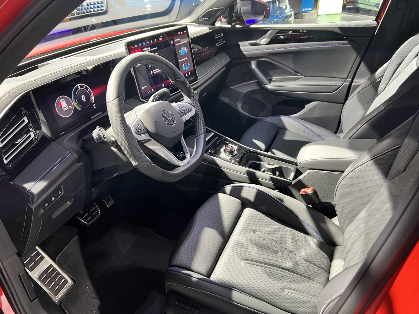 Digital dashboard and leather seats in modern car interior