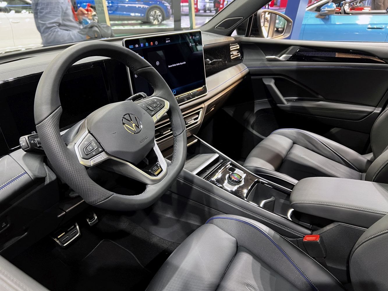 Digital cockpit, multifunction steering wheel, premium seats in modern SUV interior