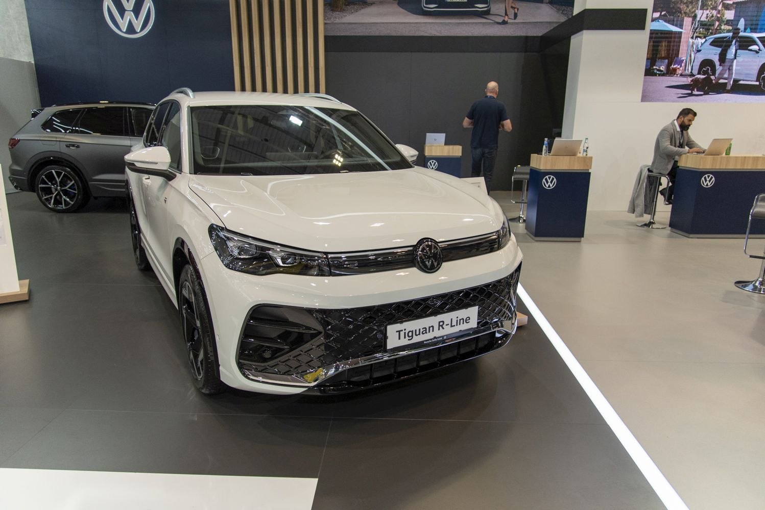 Front view showing LED headlights and textured grille