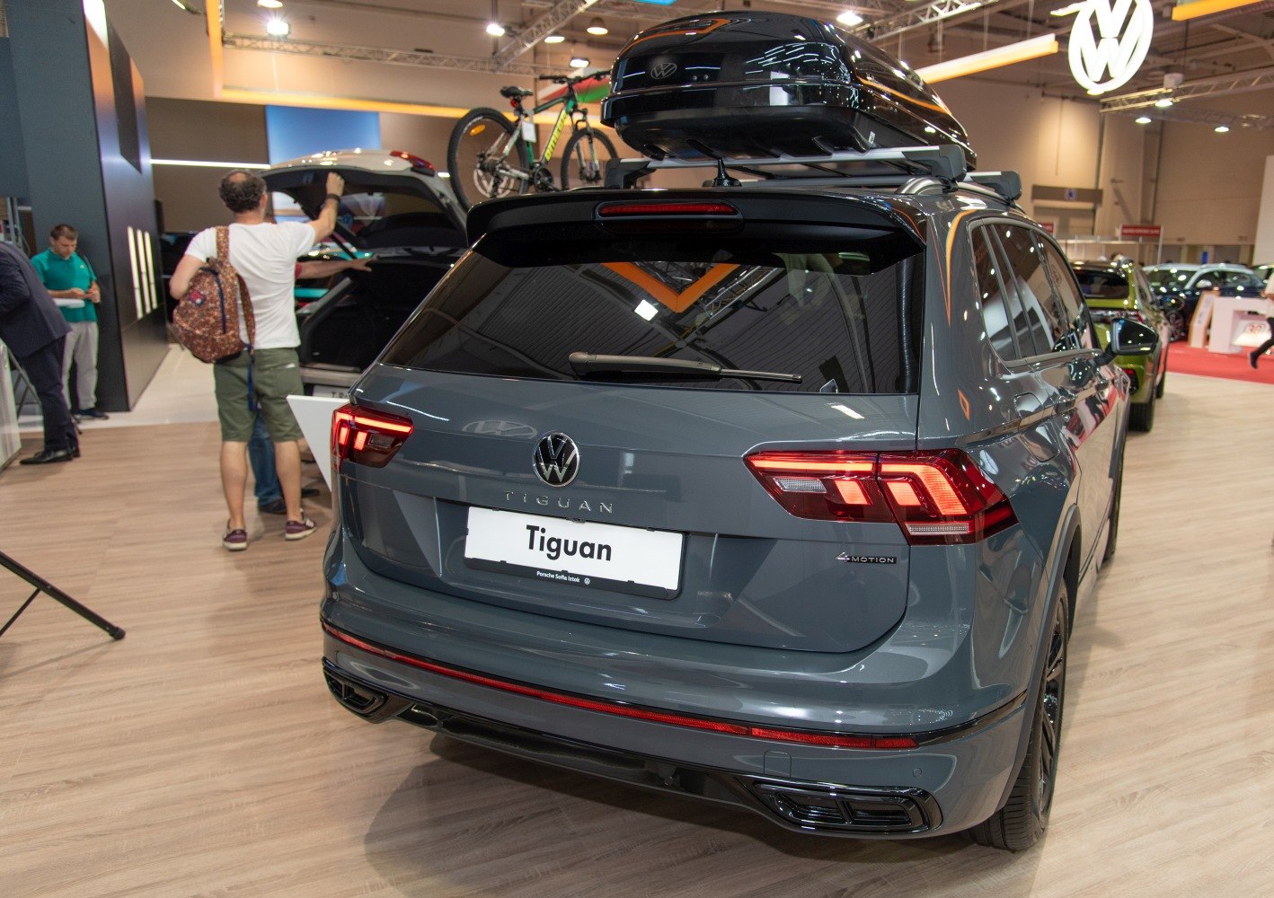 Rear view with taillights and roof box on SUV