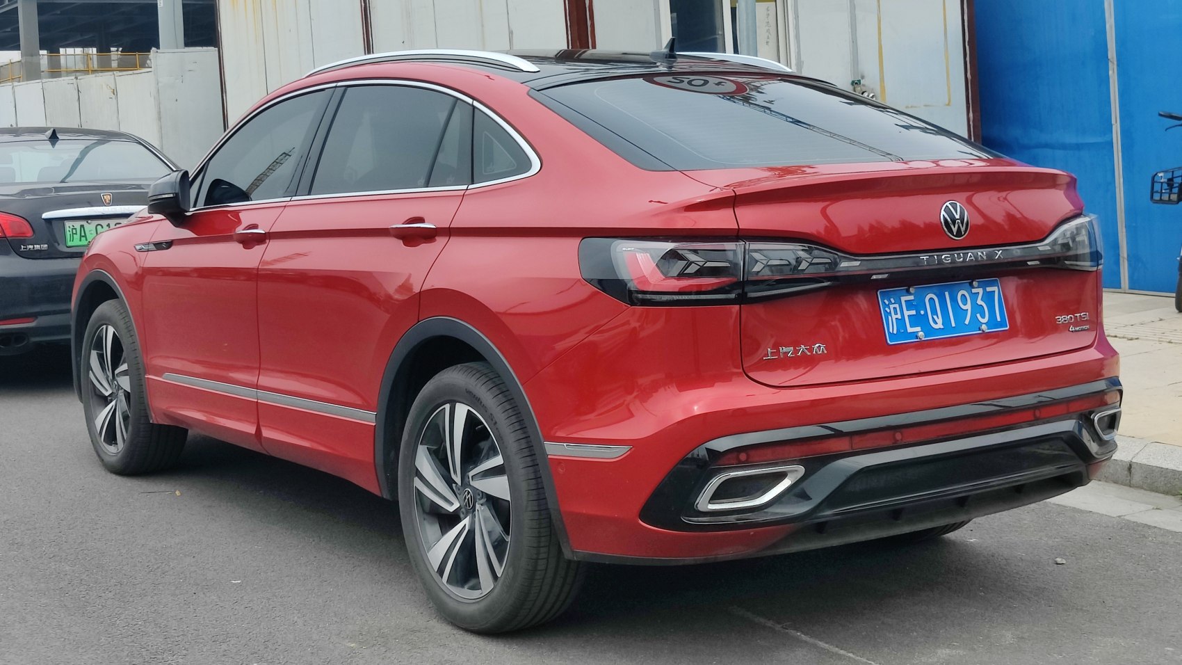 Rear side profile with sleek tail lights and sporty alloy wheels