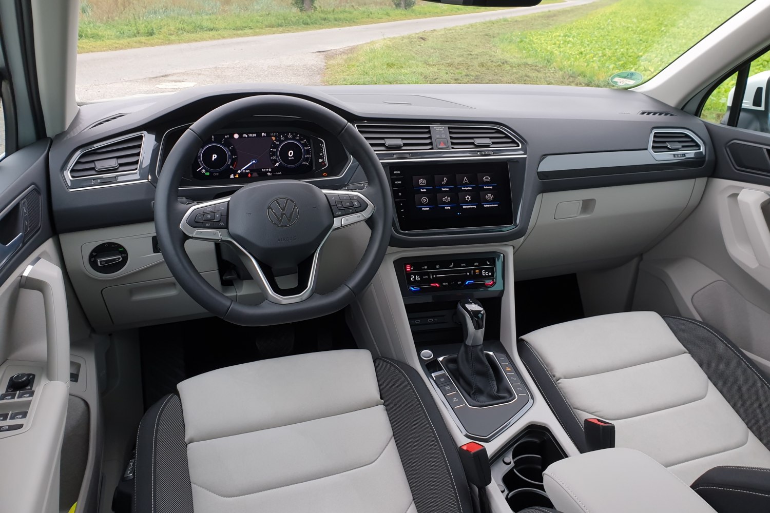 Interior dashboard with digital instrument cluster and infotainment screen
