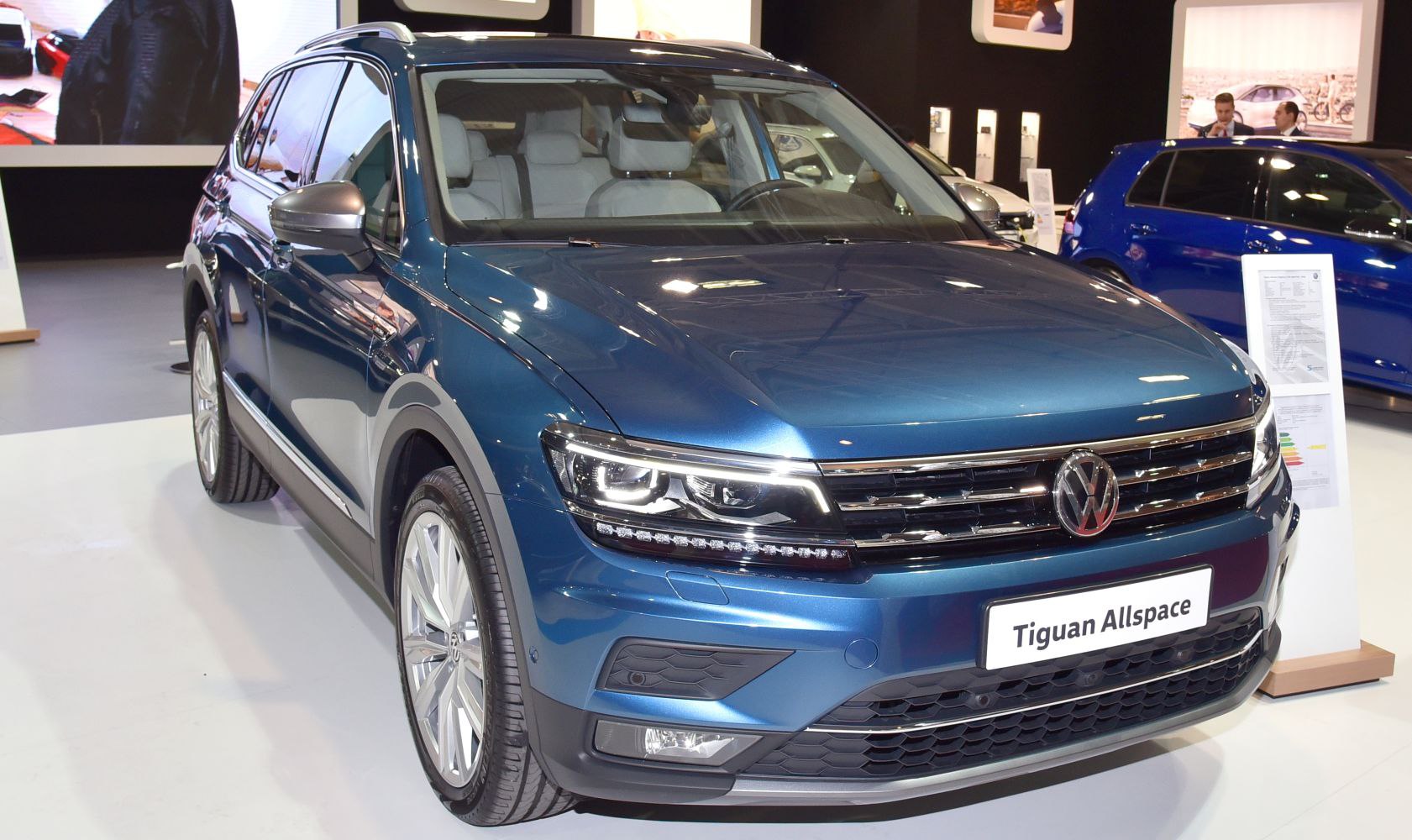 Front and side view with LED headlights and alloy wheels