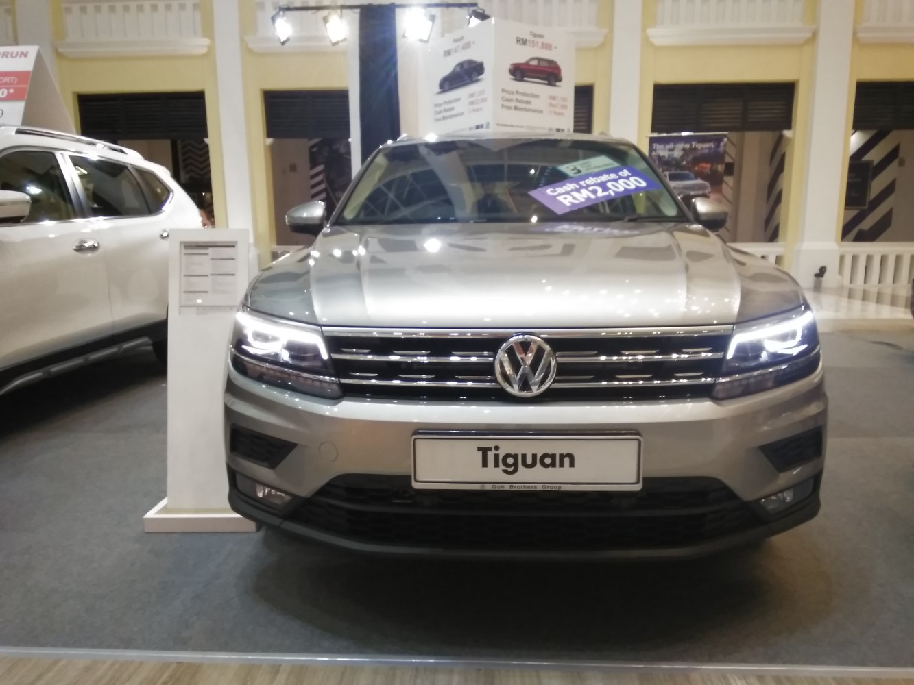 Front view with LED headlights and bold grille design