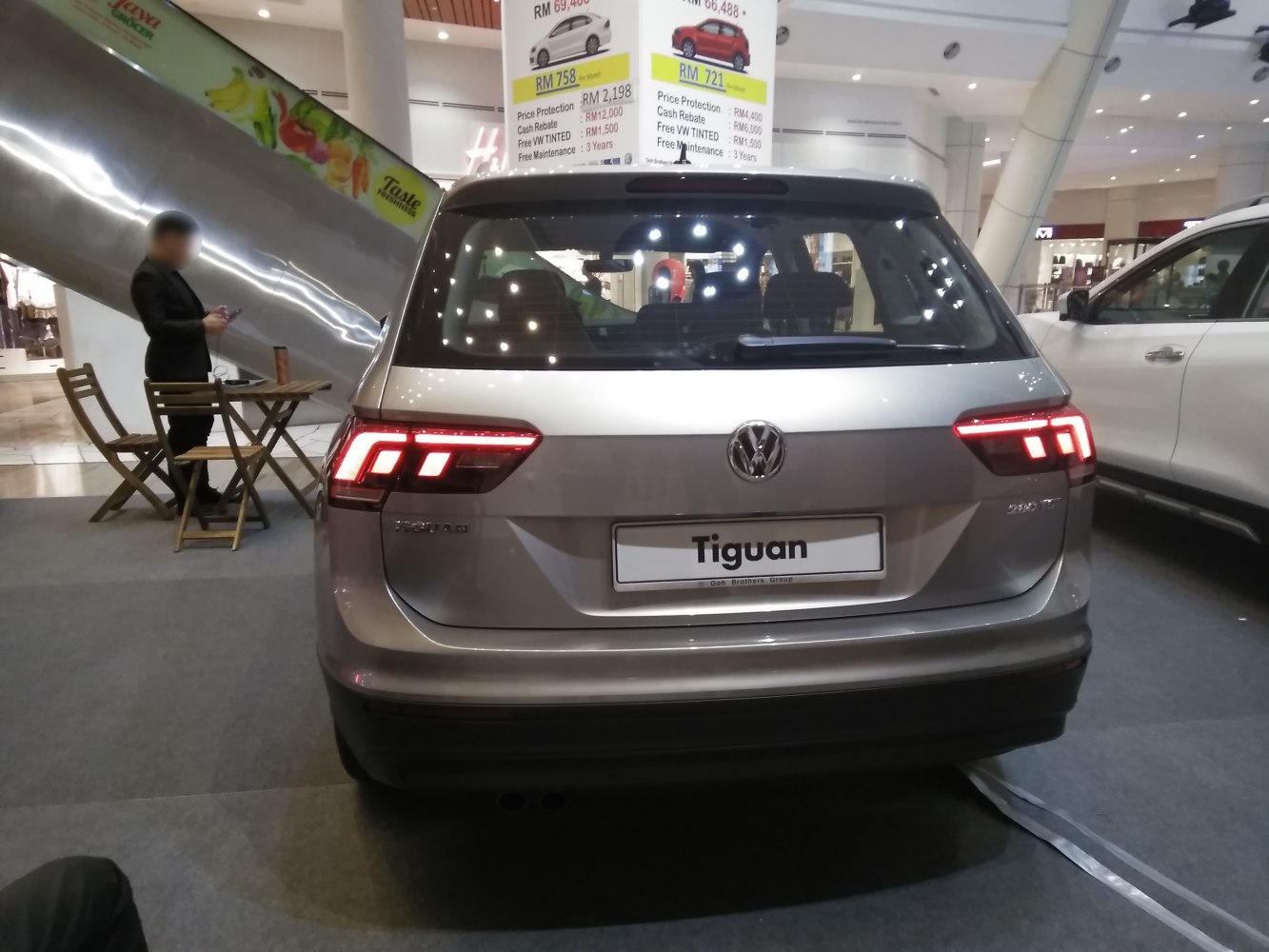 Rear view with distinctive LED tail lights and rear hatch design