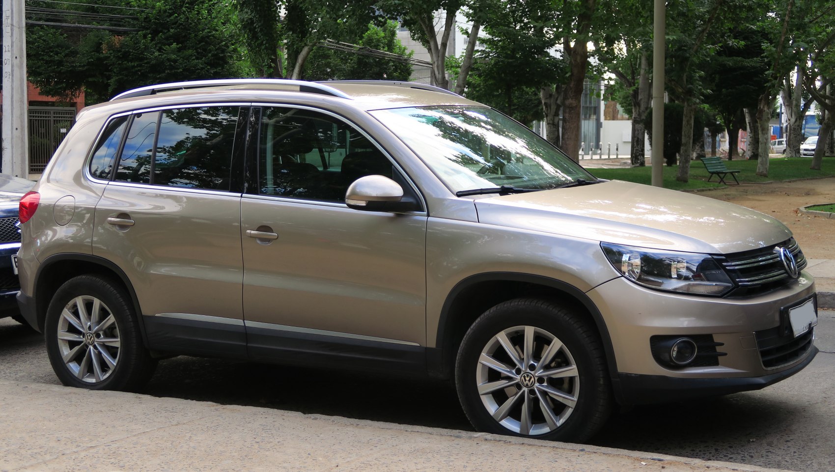 Side profile of compact SUV with alloy wheels and sleek design