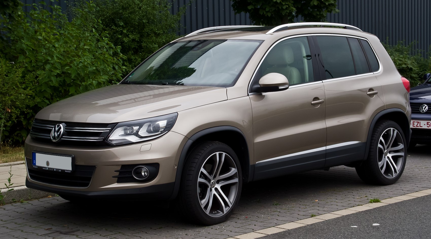 Front-side view with alloy wheels and modern headlights