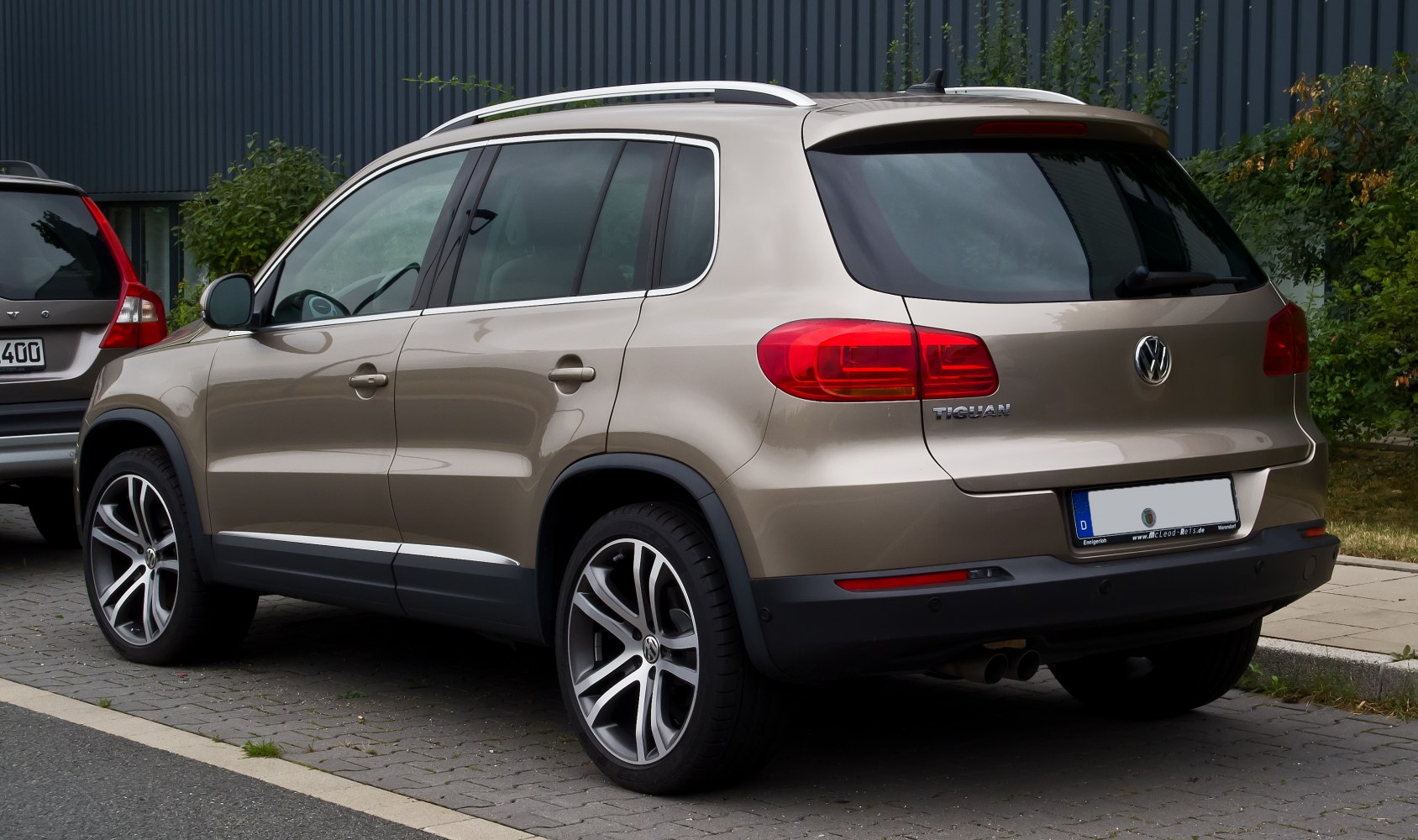 Rear side view of facelift SUV with alloy wheels