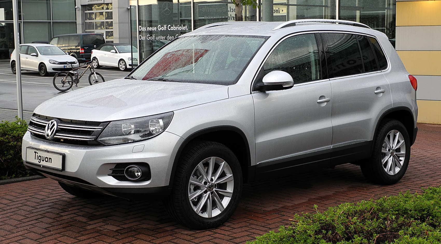 Silver compact SUV with front side view and alloy wheels