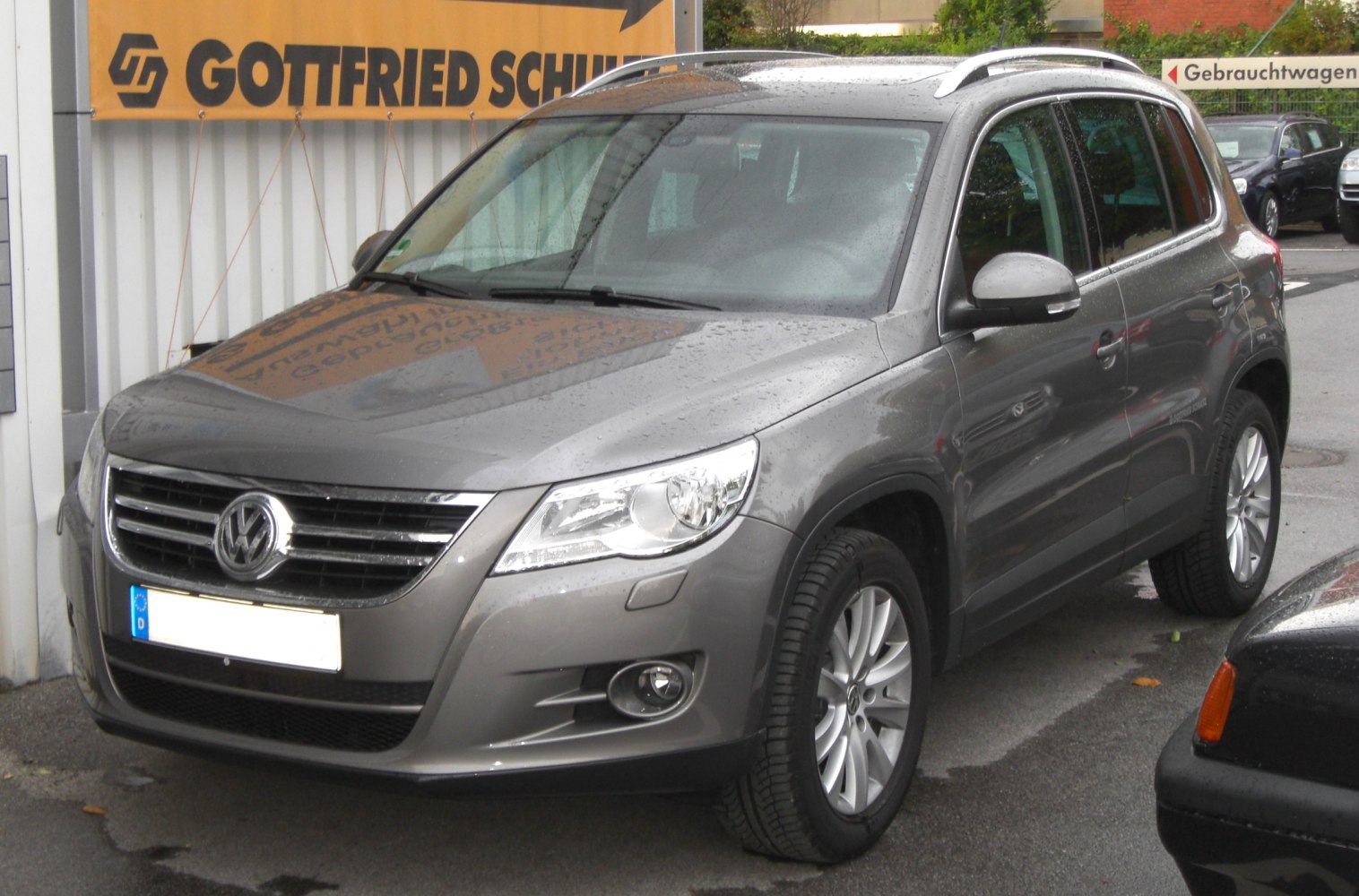 Compact SUV front-side view with chrome grille and alloy wheels