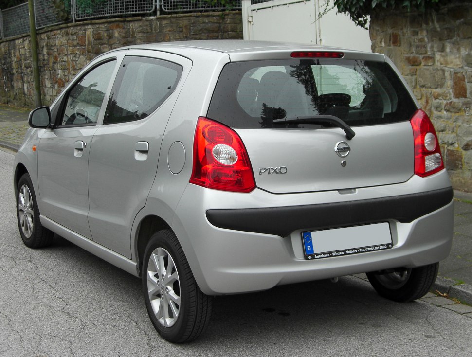 Rear hatchback view with tail lights and rear wiper