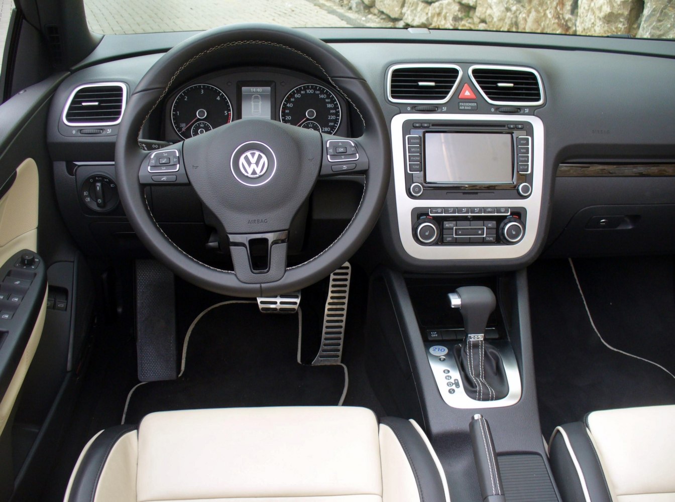 Dashboard, steering wheel, and center console interior design